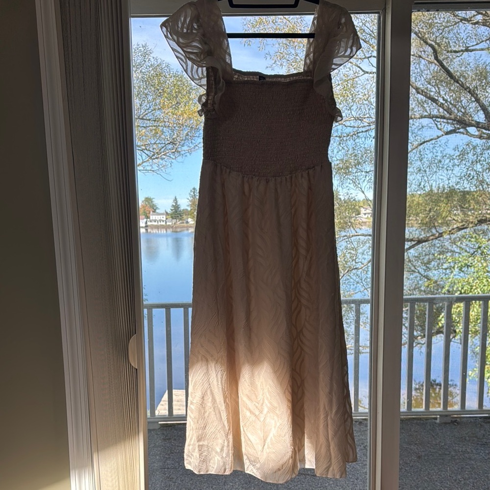 Elegant Cream Sleeveless Dress